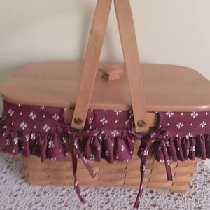 Longaberger Basket,  the inside measures 12”x 9”x7”Ht